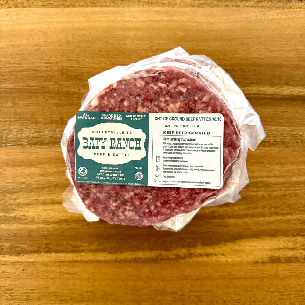 Packaged ground beef patty with Dary Ranch label on a wooden surface